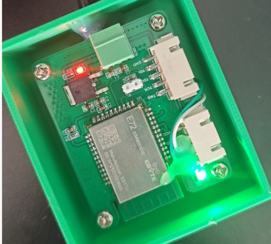 A green box with a circuit board and wires

AI-generated content may be incorrect.