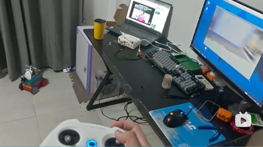 A hand holding a video game controller

AI-generated content may be incorrect.